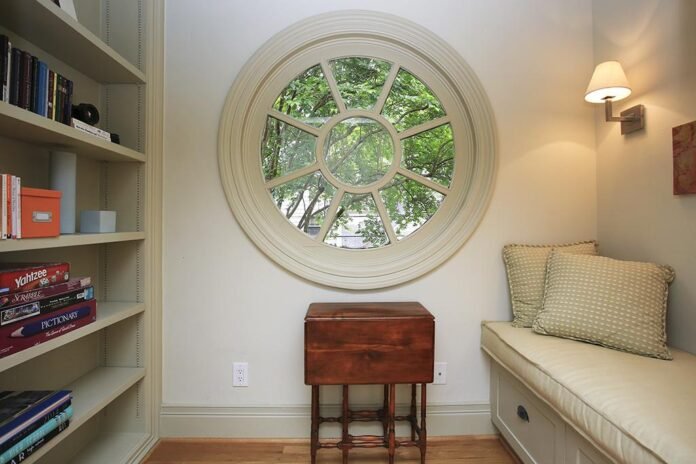 round timber window